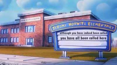 What does the sign say? WHAT