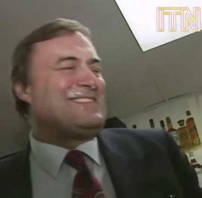 John Prescott downing a pint of lager in under 5 seconds
