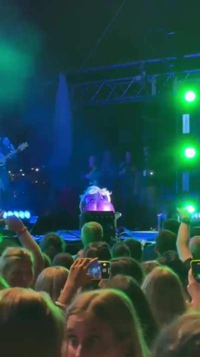 Bebe Rexha gets hit by a phone in the face while on stage