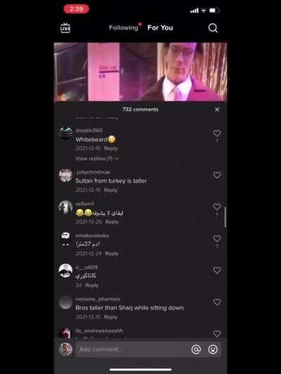 sultan from turkey towers over sky scrapers