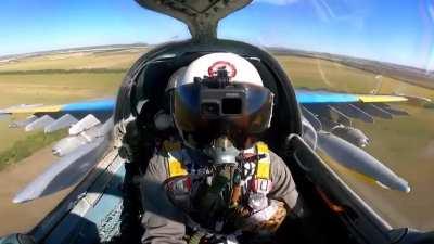 Su-25 from the 299th Tactical Aviation Brigade firing S-25 rockets at Russian targets somewhere on the front line.