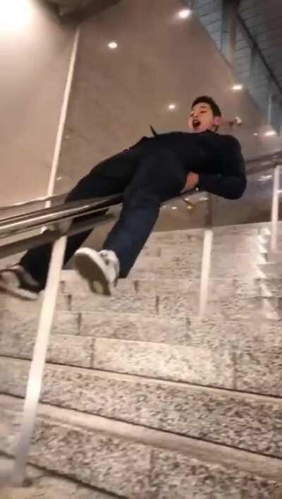 Sliding down the stairs