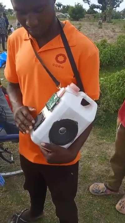 This man made a speaker out of a milk bottle and some electrical stuff