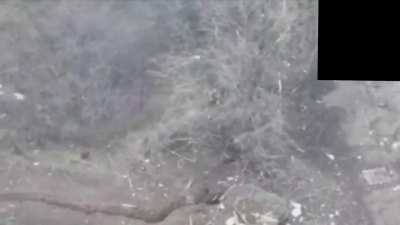 Drone footage of Russian and Ukrainian soldiers fight in close combat with small arms fire and grenades, eventually the Ukrainians retreat and call in artillery, forcing the Russian to retreat from the position also. Unknown date/location.