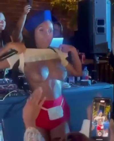 Janelle Monae flashes her tits during performance