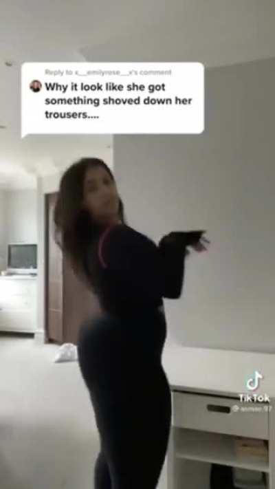 something in her ass