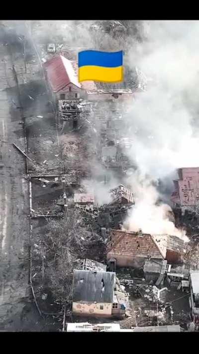 Bakhmut. A Ukrainian BMP-2 breaks through the destroyed private sector.