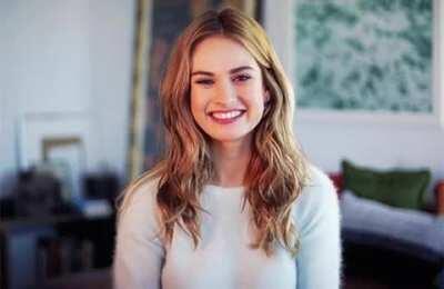 Lily James is so cute when she smiles! I’d love for her to smile when I blast her face with my load!
