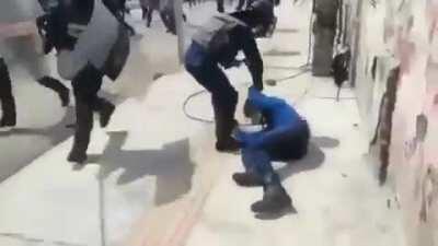 Why hit a police officer like that??.. Stupid youths.. so infuriating