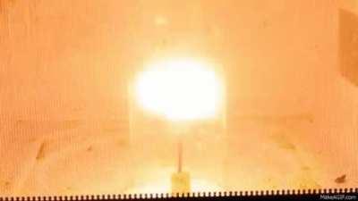 Creating plasma in a microwave oven.