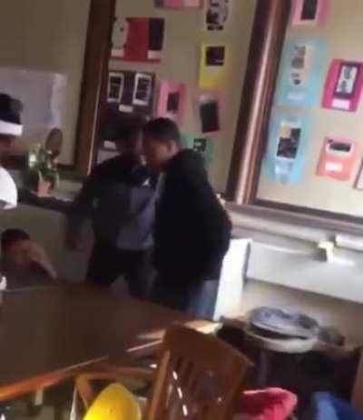Student hits his teacher in the middle of a fight (N word warning)