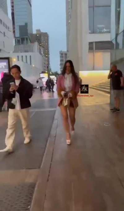 Rae walking the streets of NYC