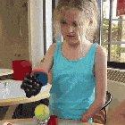 8-year-old trying out her bionic arm for the first time