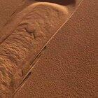 [OC] The way this sand falls on this sand dune in the Sahara