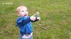 Adorable kid eats dandelion after blowing it fails