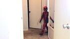 A kid dressed up as Deadpool.