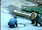 AssHole Playing With Manhole