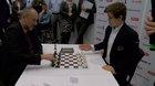 Magnus Carlsen (right) playing chess. A really slow and boring match.