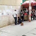 Man beating up a beggar meets Leonidas