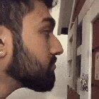 A bun making sure to kiss their human goodnight