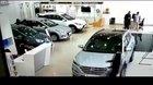 Driver crashes through glass window at a dealership while trying new car