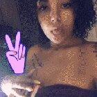 Hidden behind her towel