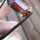 a 15.9 dichroic Oregon Sunstone that faceted with hand carved V grooves on the pavilion. a beautiful example of the deep red and green material that comes from Sunstone Butte Mine. Thanks for looking!
