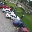 Guy mowing lawn tackles robber and then goes back to work