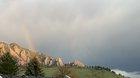 Early morning rainbow, showers, and sun