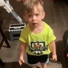 His mother left for work without kissing him and now he is complaining to his father