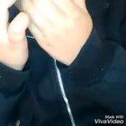 Girls puts a fake doll eye on her eyes