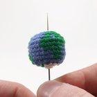 A teeny tiny planet earth I crocheted for earth day!