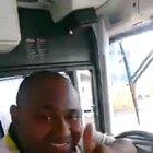 Bus driver posing for the camera