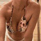 Taking off my bikini after a sweaty day in the sun.