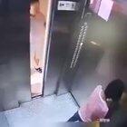 Mother beats her child in the elevator