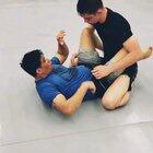 Smooth jiu jitsu move to triangle. Train Brazilian jiu jitsu.