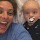 This cute baby can’t believe he is seeing his mommy in the camera while she is sitting beside him