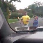 Neighborhood children giving a hunter a hard time.