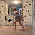 Filming her home workout