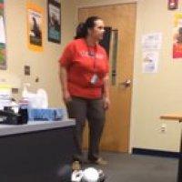 Student hides under desk and grabs teacher's ankle