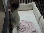 Dad trapped in baby's crib