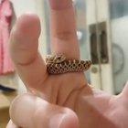 A tiny snake giving finger hugs