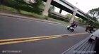 Man thinks he's really about that bike life.. yet wheelies straight into an oncoming vehicle