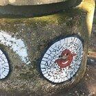 I was wondering through some random woods near me and found a meme shrine.