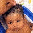 Little dude getting his hair washed