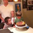 Blowing birthday candles.