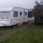 Travellers smash up rivals caravan and house