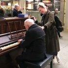 The singer happened to be walking by, and saw this lovely man playing a tune so she decided to join in. They made something spectacular.