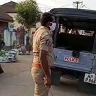 Guy repeatedly hit by Indian policeman, doesn't even blink