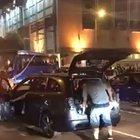 Woman begs her husband to not attack protesters with a metal pipe shouted, 